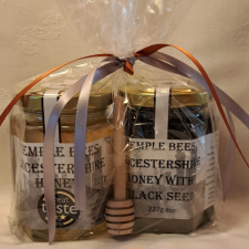 Runny Honey & Blackseed Honey 8oz in cellophane bag with honey dipper