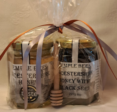 Runny Honey & Blackseed Honey 8oz in cellophane bag with honey dipper